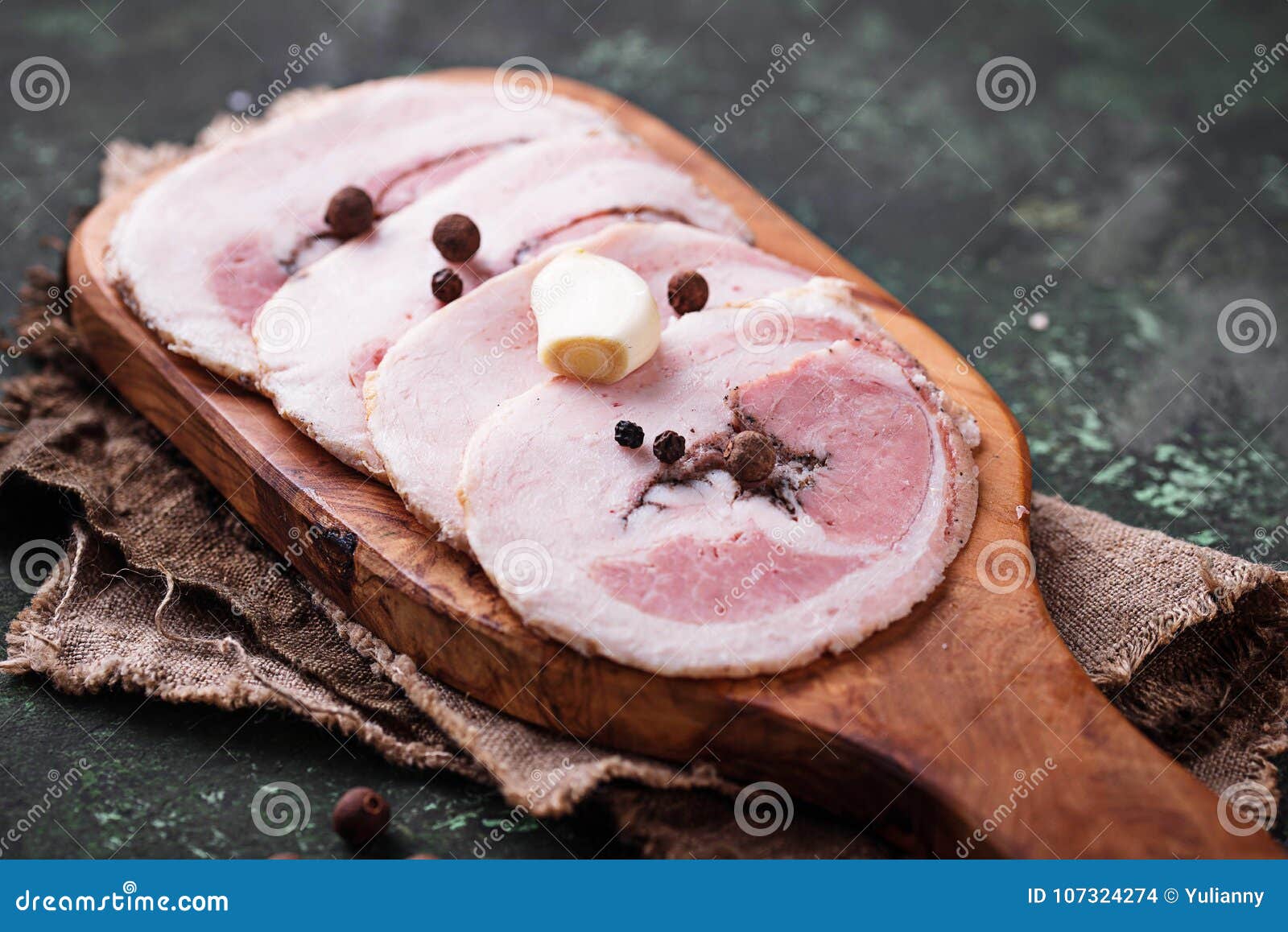 slices of bacon with pepper and garlic