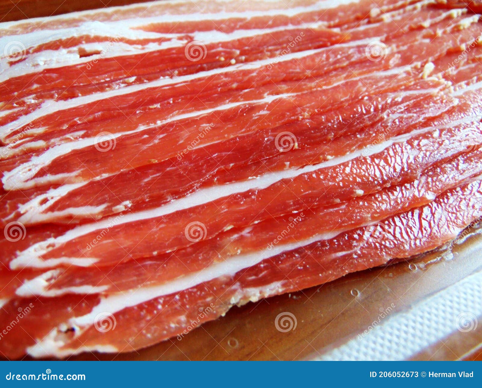 Slices of bacon on a plate stock image. Image of meat 206052673