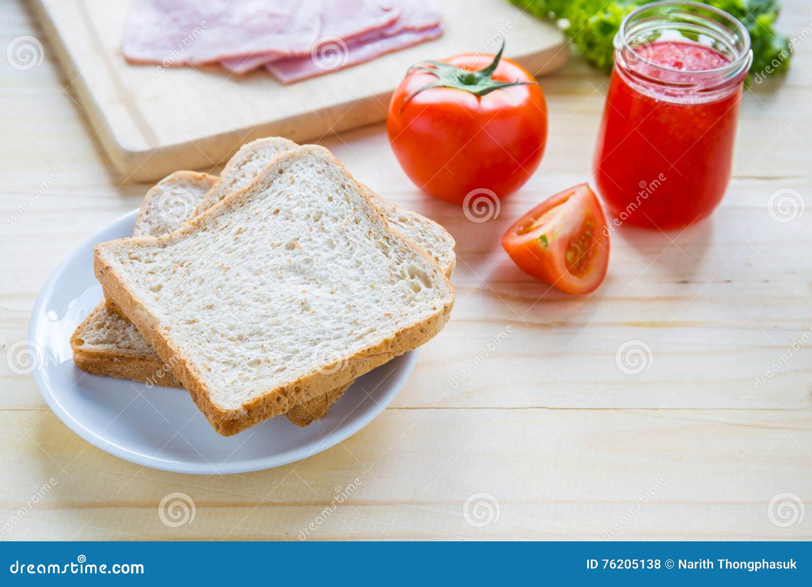 Slices of Bread with Jam and Ham, Tamoto, Lettuce. Stock Photo Image