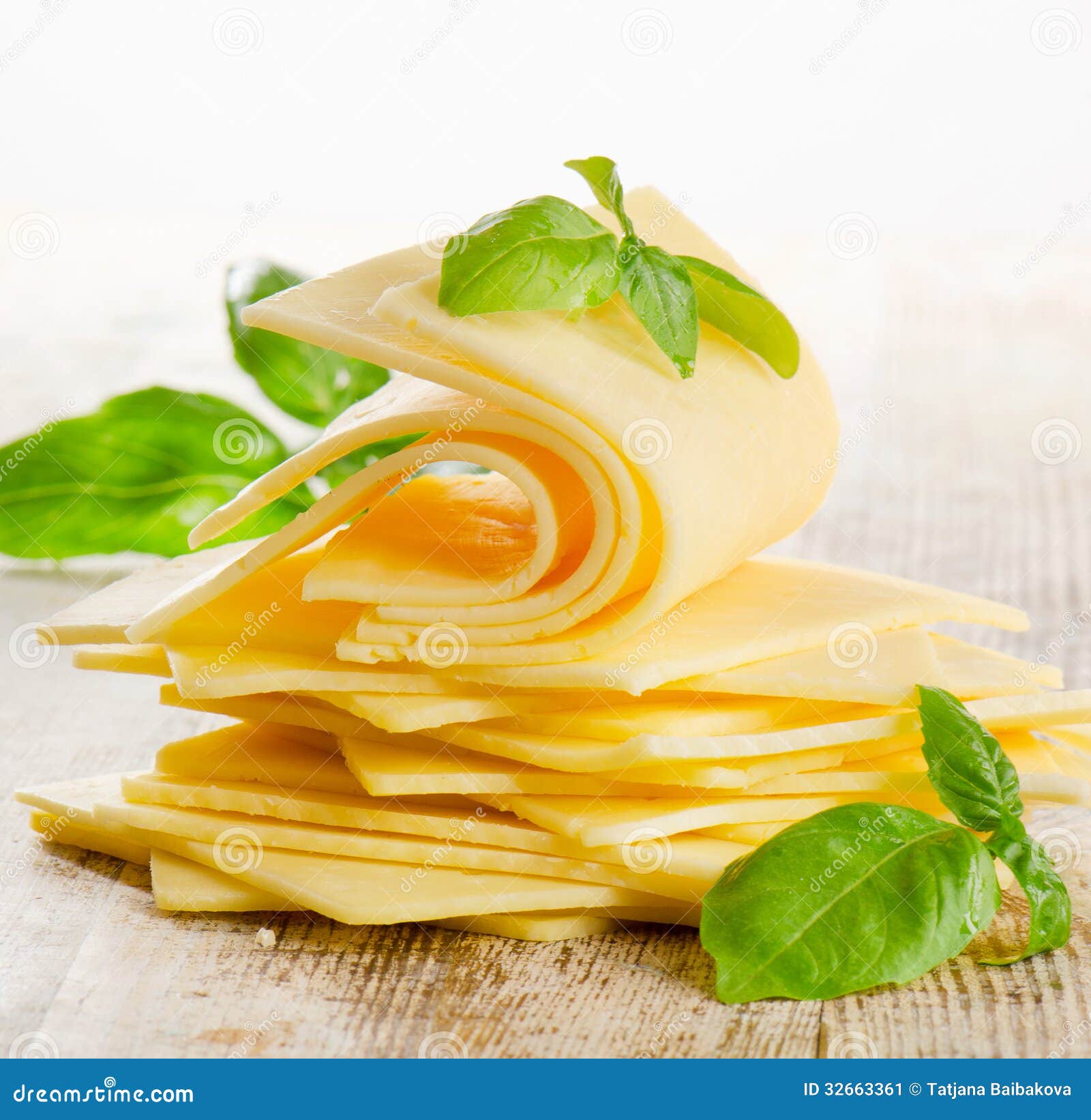 Slices of cheese stock image. Image of product, leaf 32663361