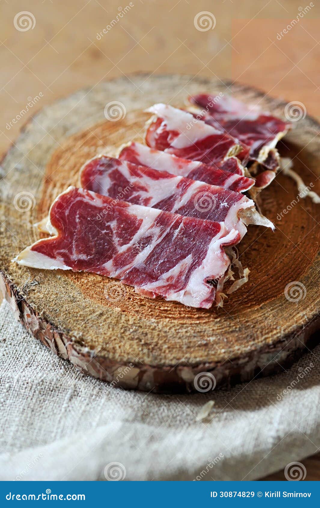 Slices of Cured Jamon on a Wooden Cutting Board Stock Image Image of