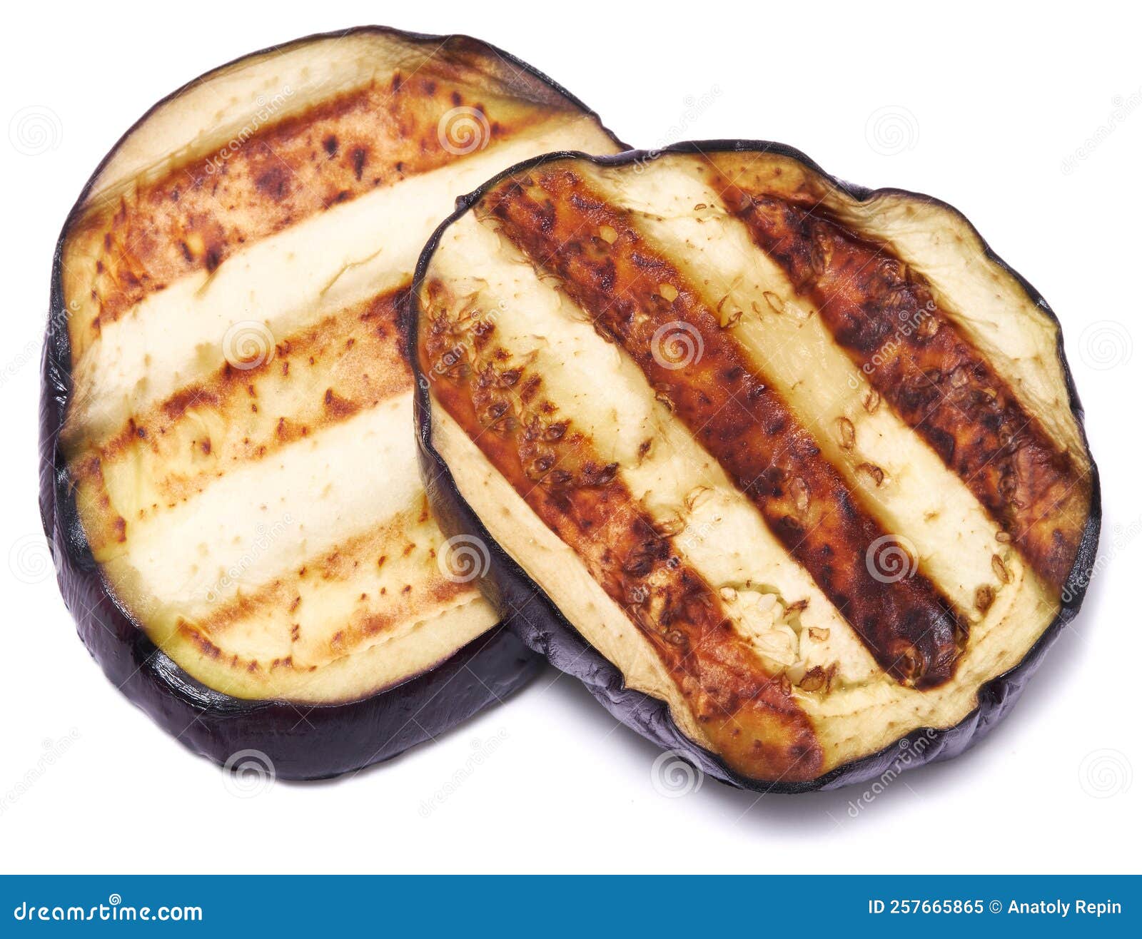 Slices of Eggplant Roasted on a Grill with Stripes from a Grill