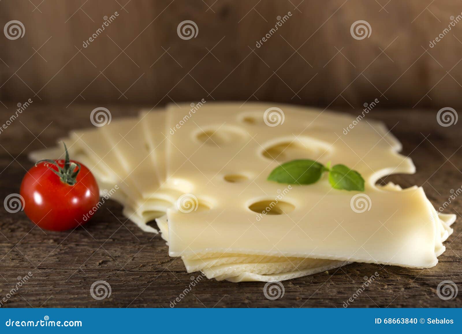 Slices of Emmental cheese stock photo. Image of background 68663840