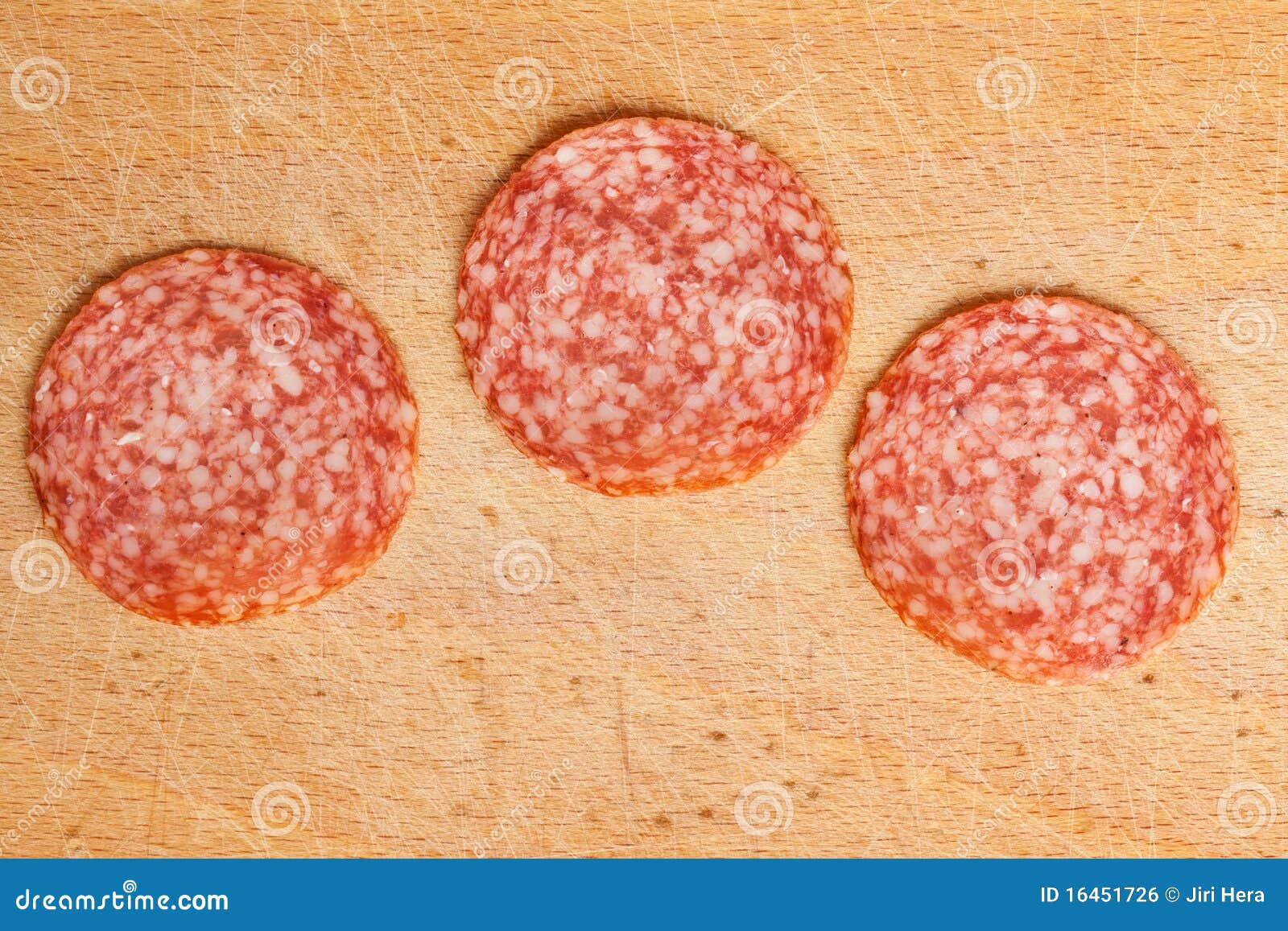 Slices of fresh salami stock photo. Image of tasty, sliced 16451726