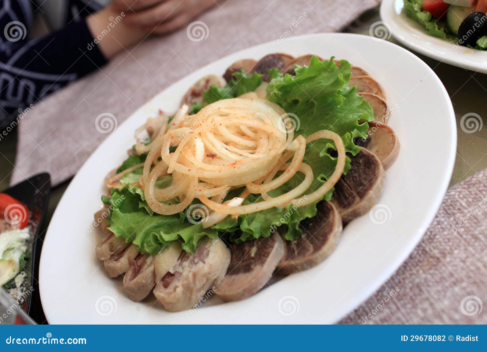 Slices of Horse Meat with Onion Rings Stock Photo Image of lettuce