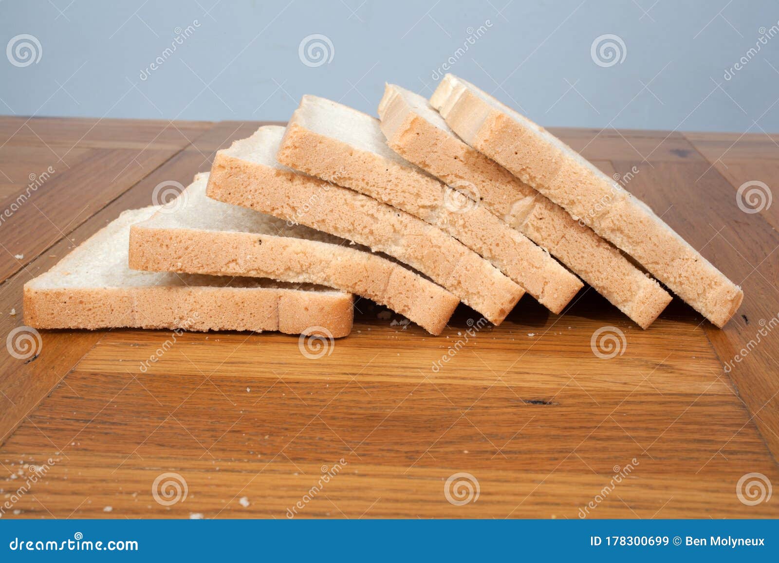 slices of white bread on a kitchen table