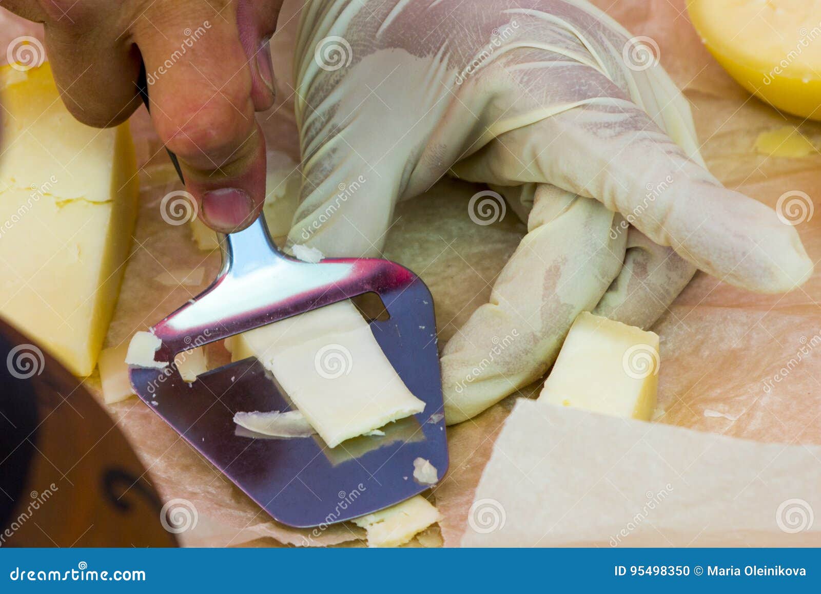 Slicing cheese for tasting stock photo. Image of ingredient 95498350