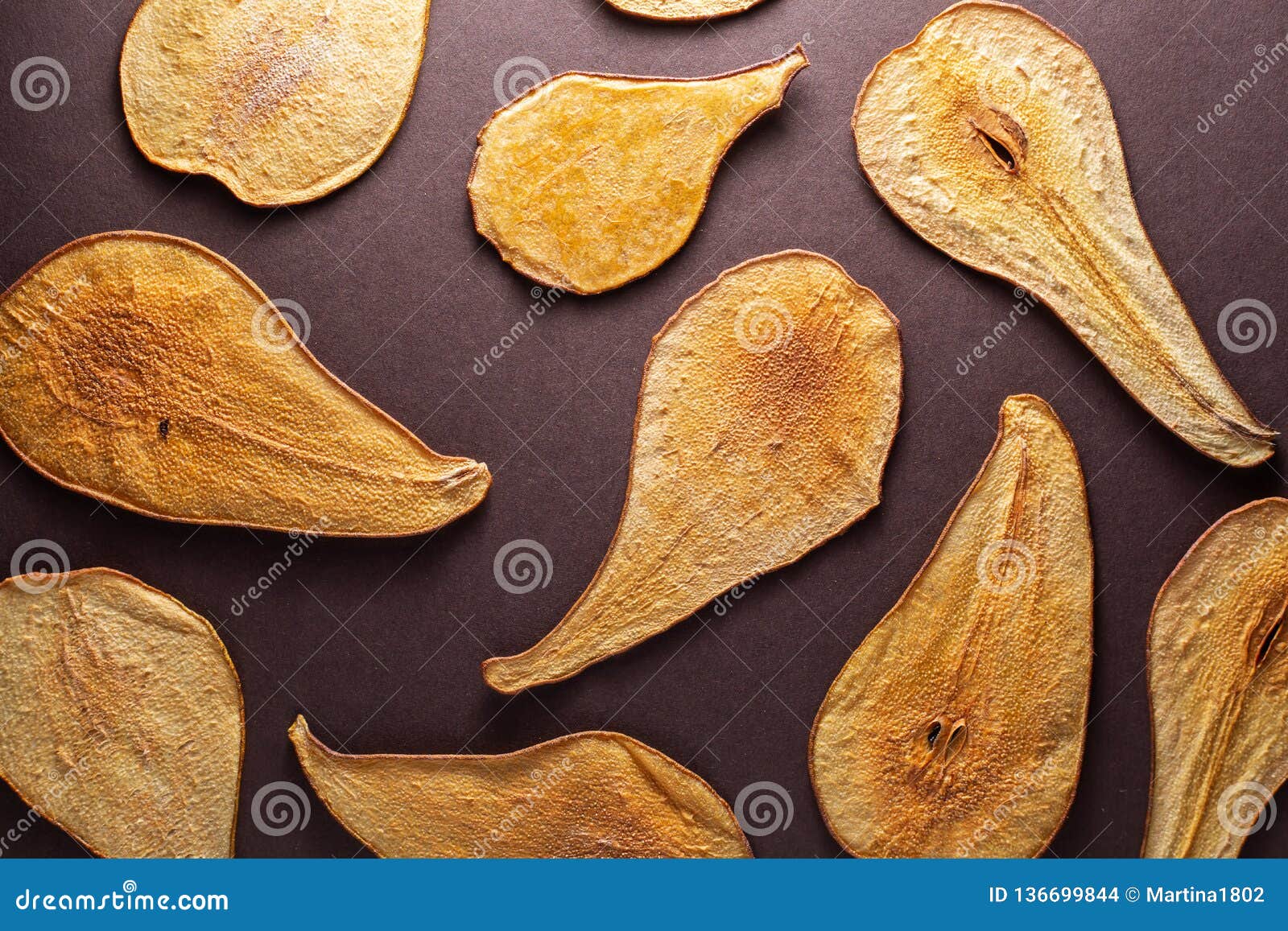 Slides Thinly Sliced Pears Drying In The Sun, Background. Dried Pears