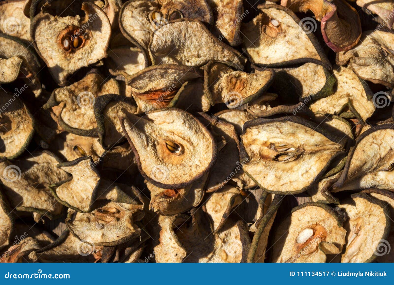 Slides Thinly Sliced Pears Drying in the Sun, Background. Stock Image