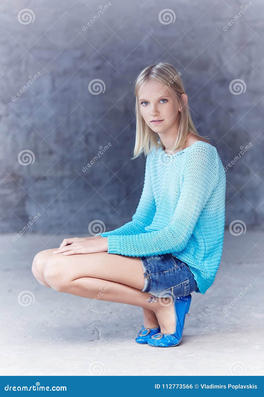 Slim Blond Girl in Azure Clothing. Stock Photo - Image of face ...
