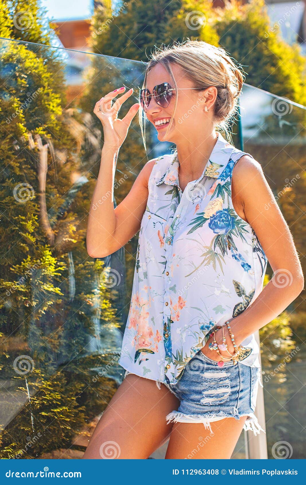 Slim Blond Woman In Jeans Shorts Posing Stock Photo Image Of Nature
