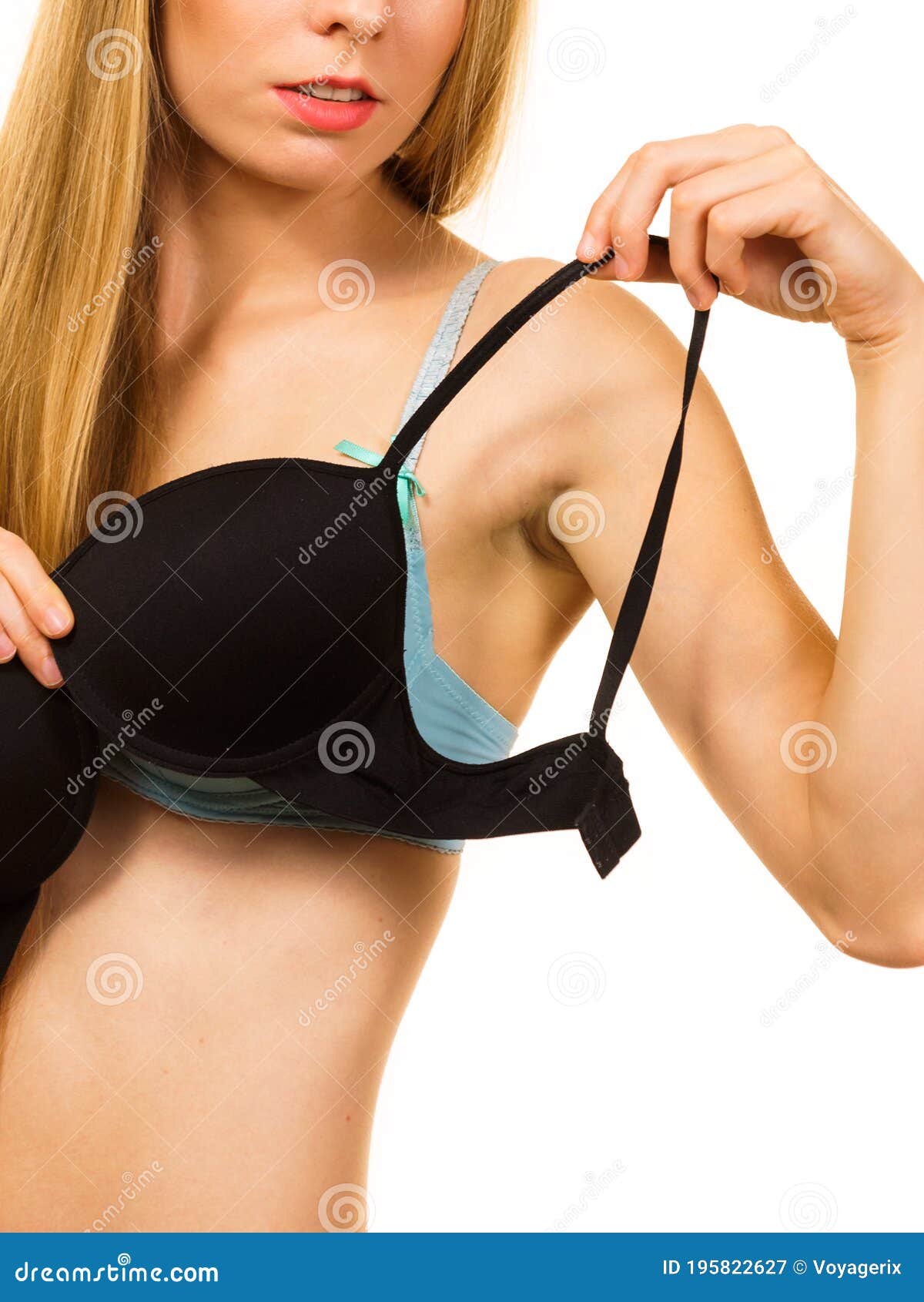 Woman trying on a bra hi-res stock photography and images - Alamy