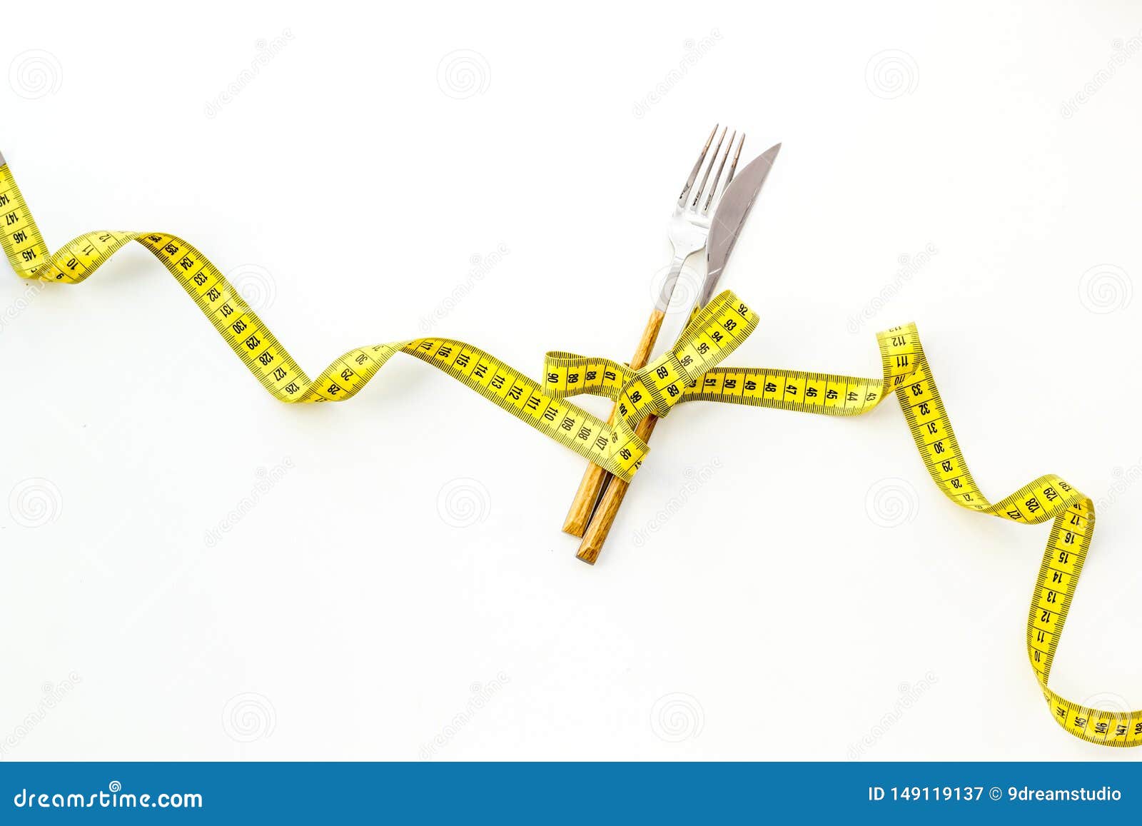 Download Slim Concept With Flatware And Measuring Tape On White ...