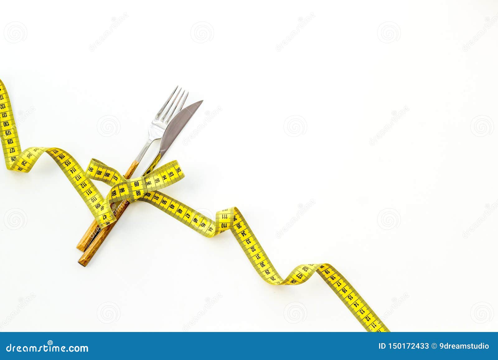 Download Slim Concept With Flatware And Measuring Tape On White ...