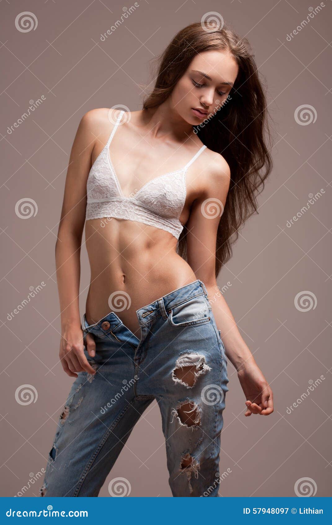 Close Up Of Unrecognized Young Athlete Asian Girl In Sportswear Standing  With Six Packs Abs Abdominal