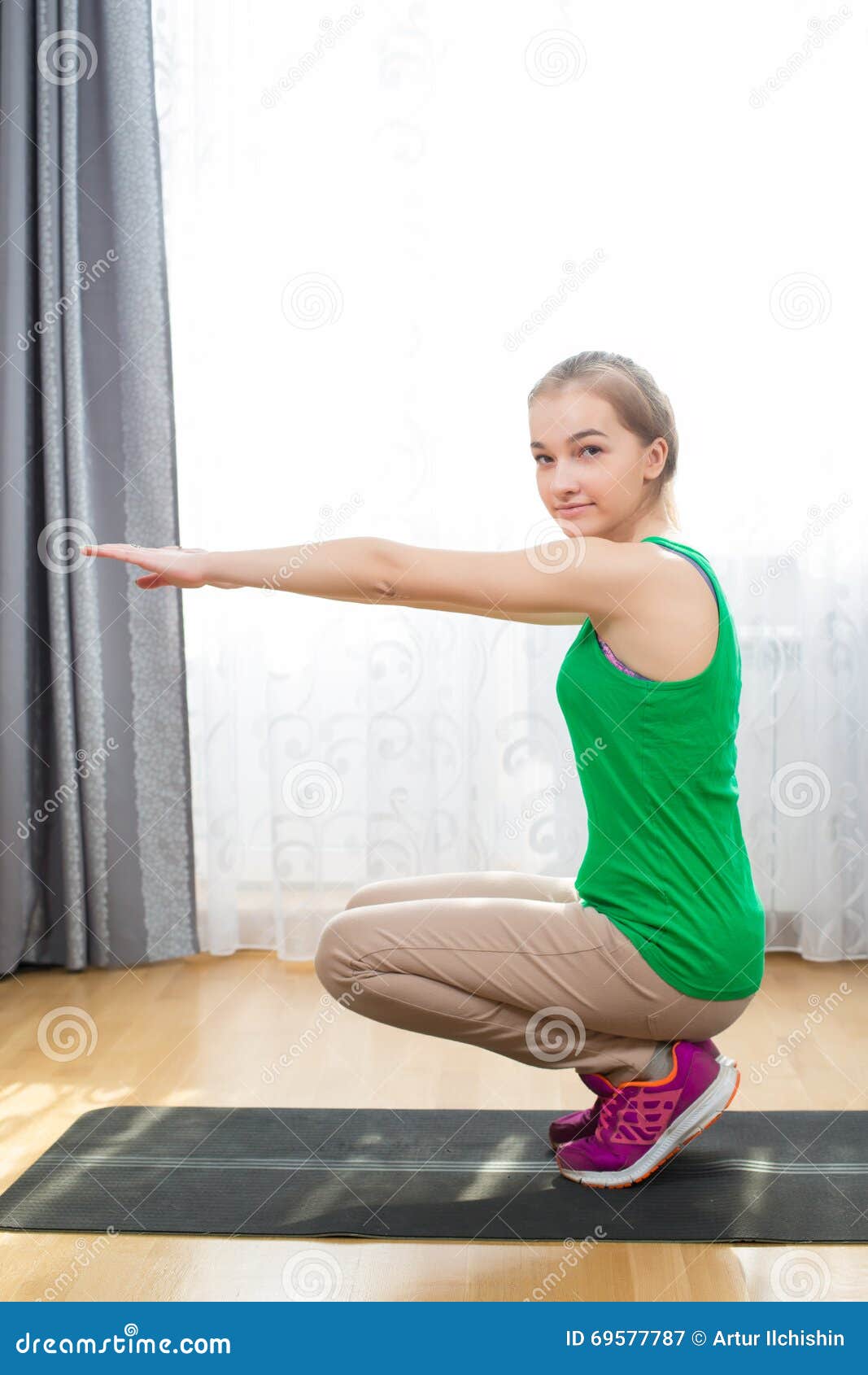 Slim Girl Doing Squats on Yoga Mat at Home Stock Image - Image of ...