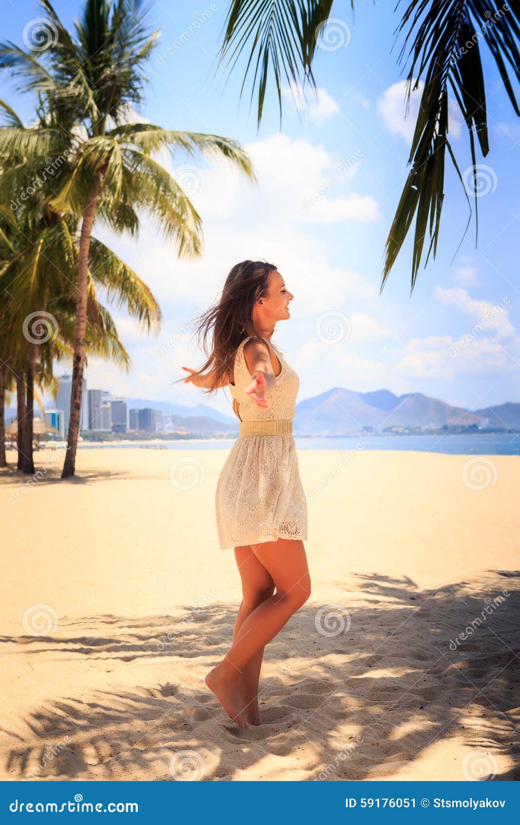 Slim Girl In White Frock Poses With Hands Aside On Beach Stock Image Image Of Ocean Hand