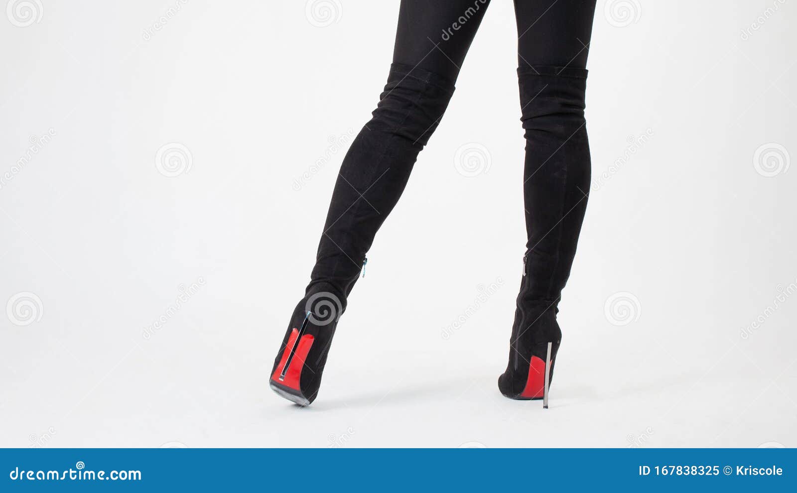 Slim Legs in Black Boots and Pants. Walking in High Heels Stock Image ...