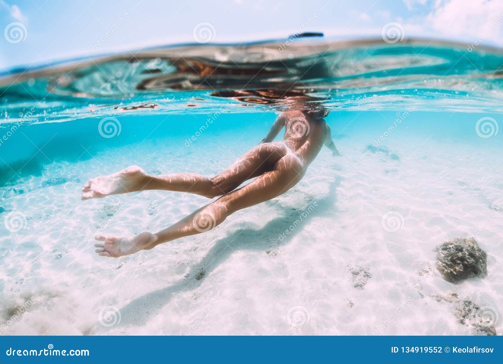 nude girl swimming in the sea