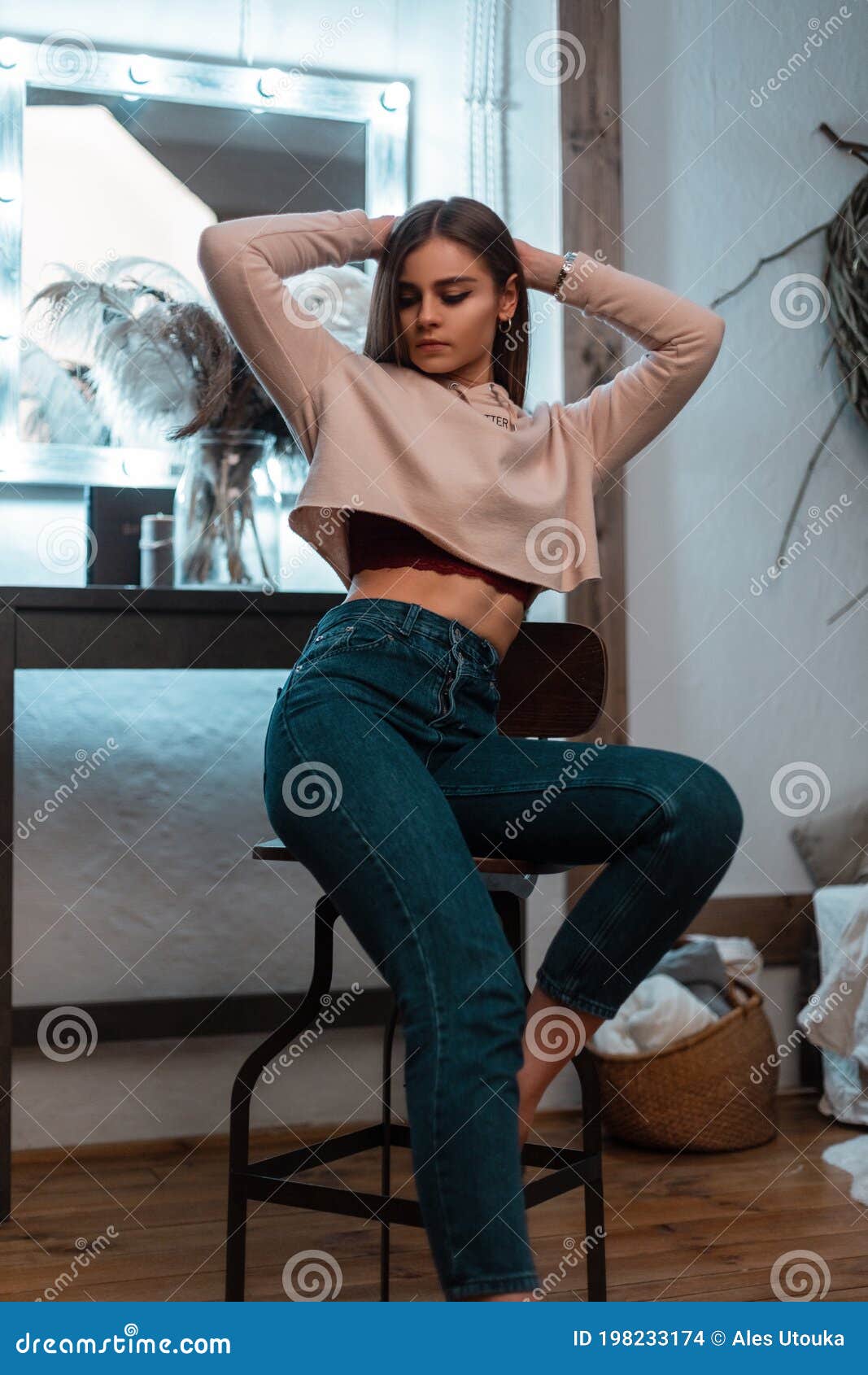Young stylish brunette girl on shirt, pants, jeans jacket posed background  iron fence. Street fashion model concept. 6631463 Stock Photo at Vecteezy