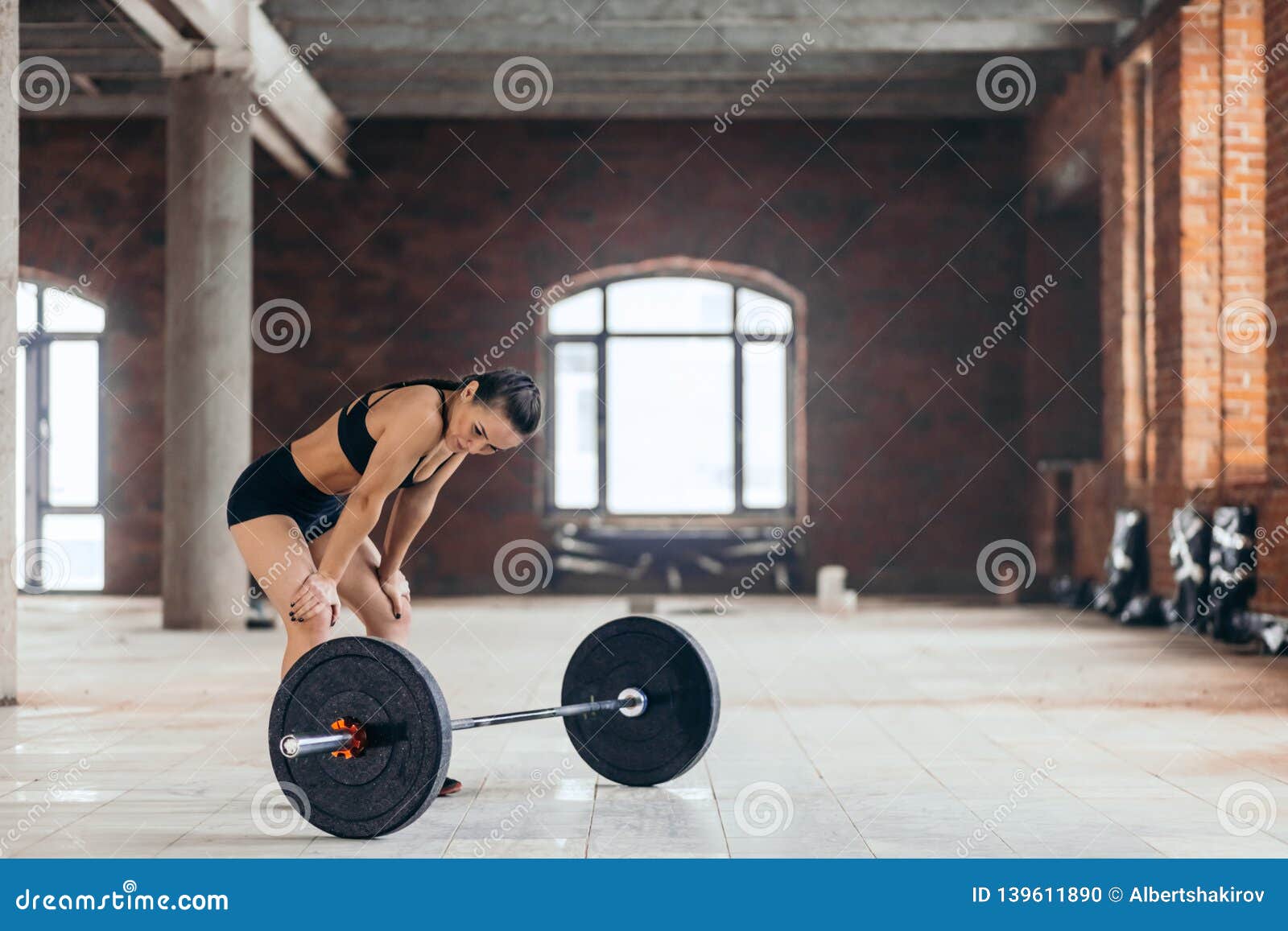 Slim Woman Having a Rest after Workout at Gym Stock Photo - Image of ...