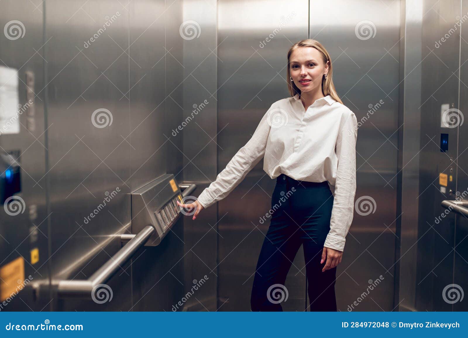 Slim Young Blonde Woman in the Elevator Stock Photo - Image of blonde