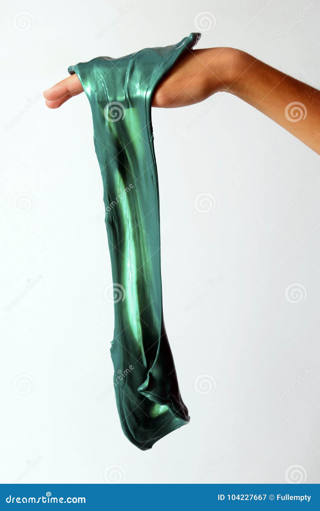 slime elastic and viscous on child`s hand