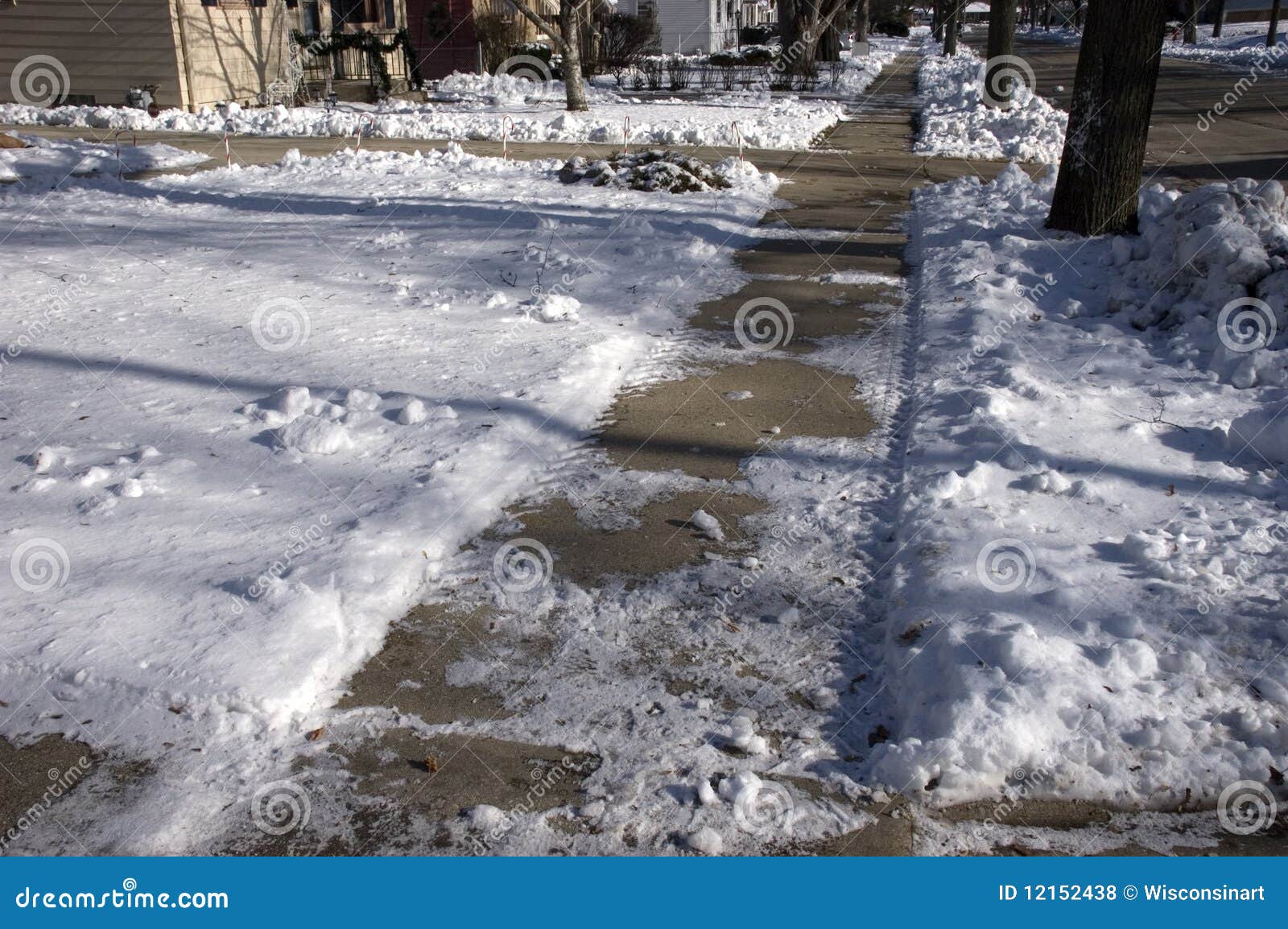 slippery, icy sidewalk in the city