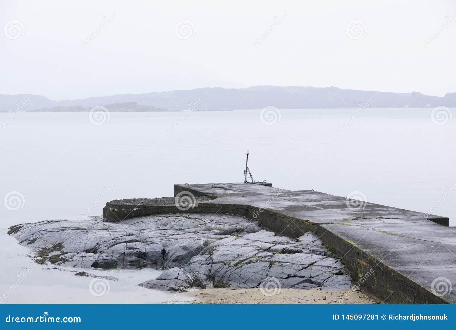 slipway pier jetty for boats construction in concrete old stone in arduaine at argyll and bute scotland