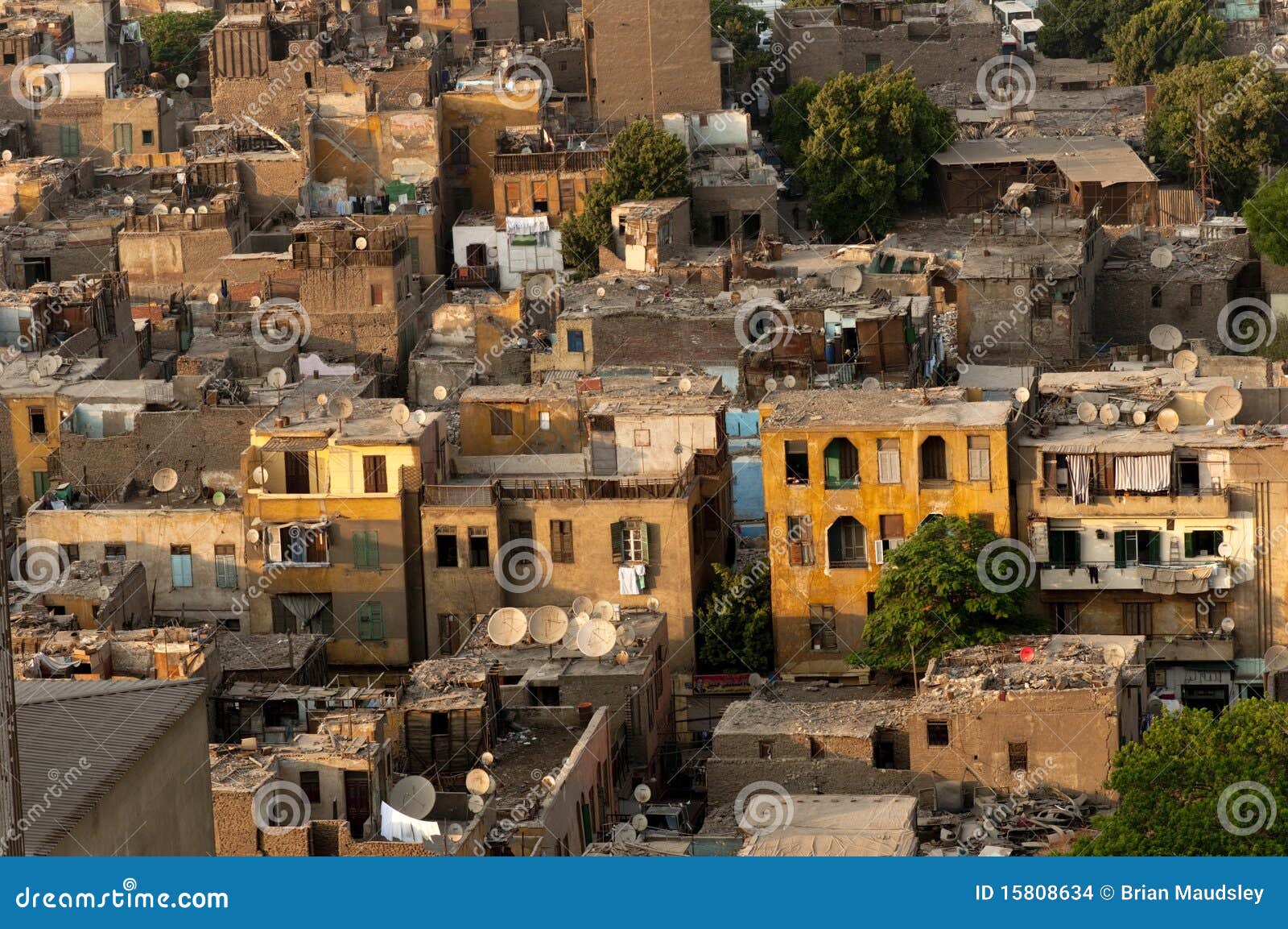 slum cairo roofs with satellite dishes.