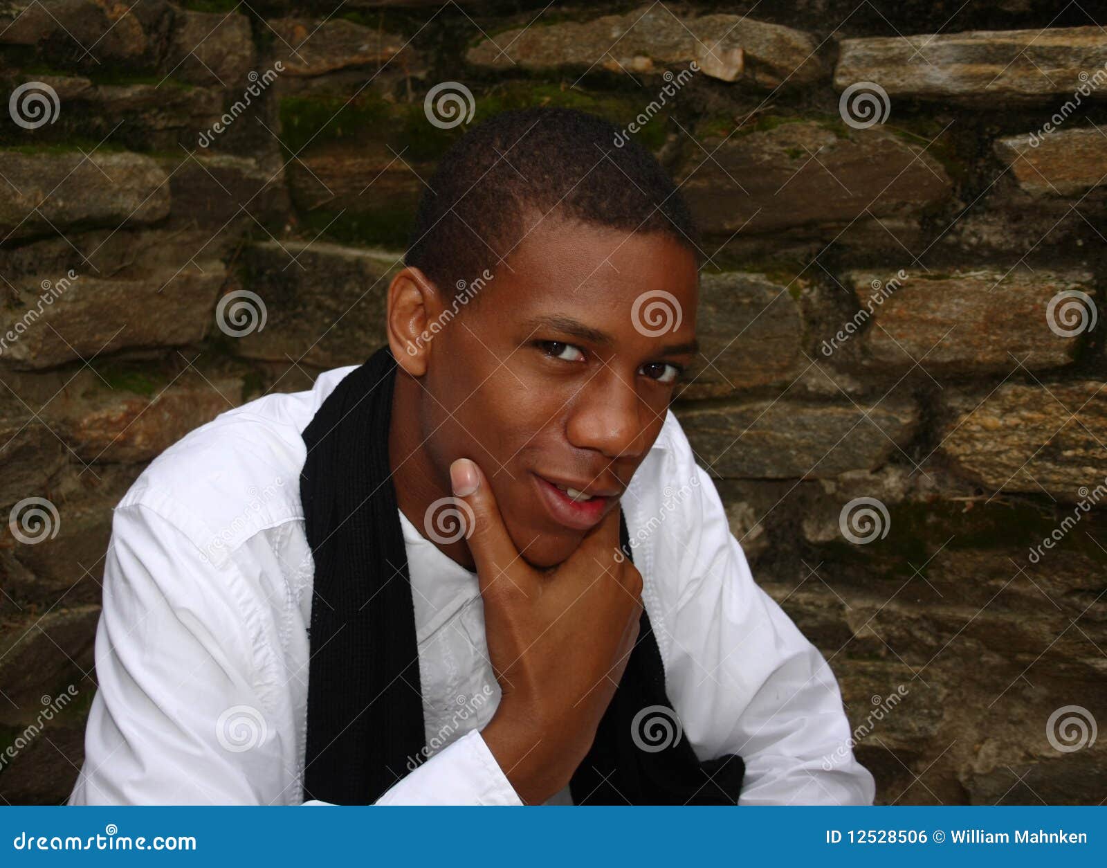 Sly Looking African American Male Stock Photo Image of person, adult