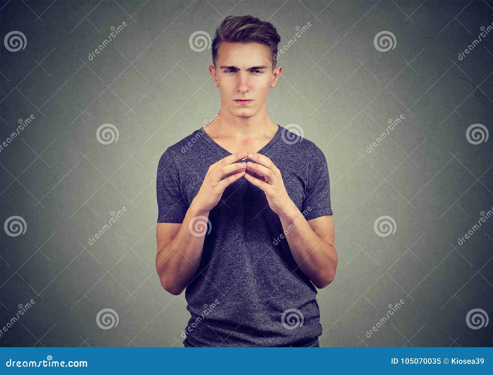 sly man looking at camera