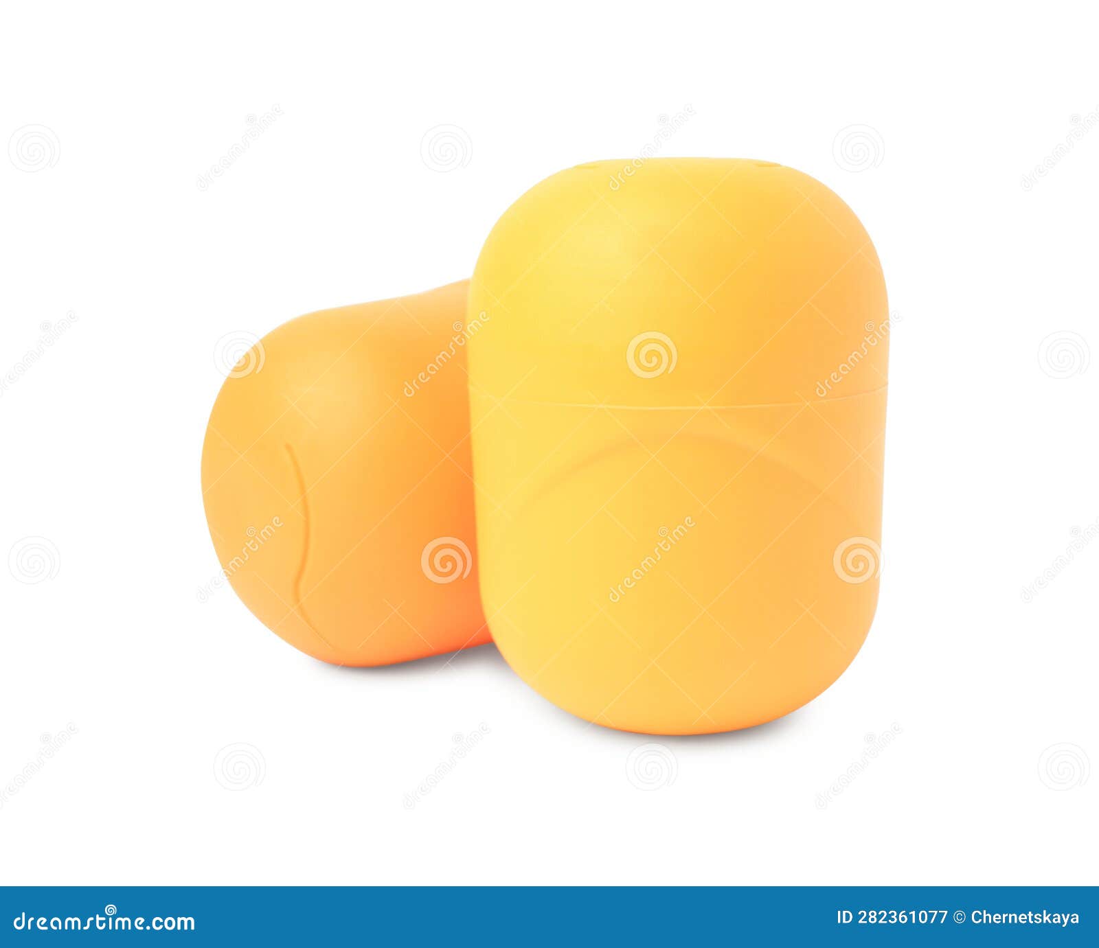 slynchev bryag, bulgaria - may 23, 2023: yellow plastic capsules from kinder surprise eggs on white background