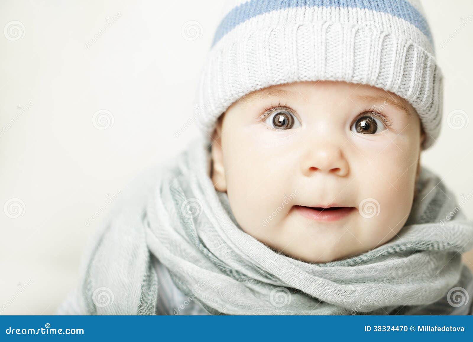 Small baby in blue cap stock photo. Image of person, care - 38324470