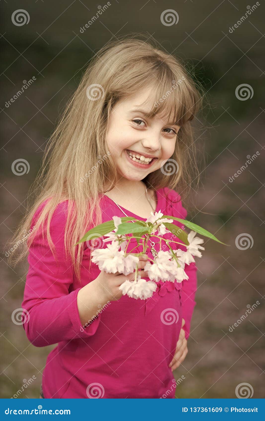 Small Baby Girl with Smiling Face Holding Pink Sakura Blossom ...