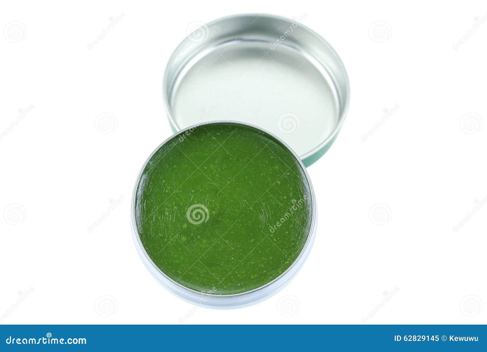 a small balm jar full of medicated ointment in green