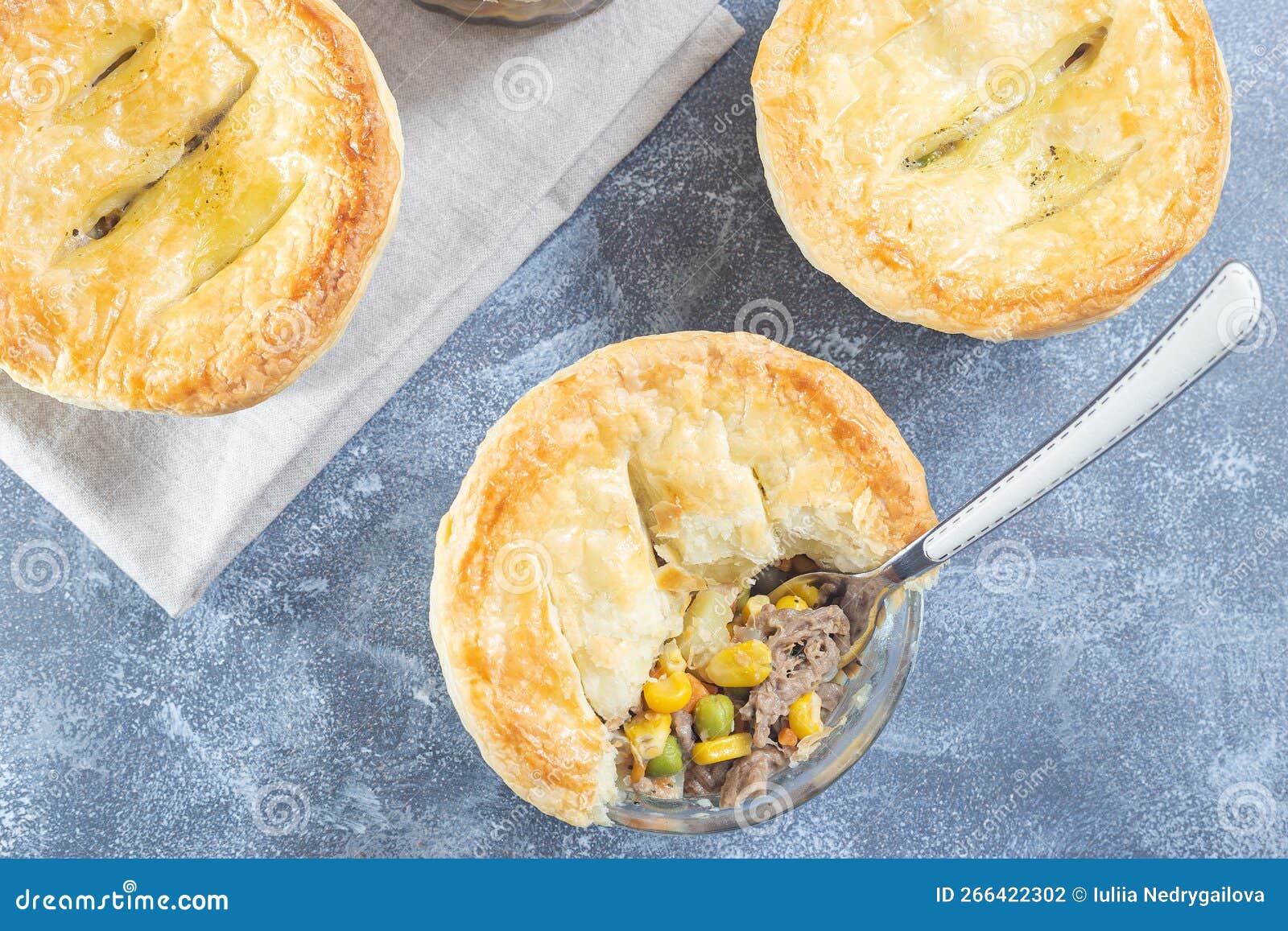 Small Beef Pot Pie or Deep Dish Pie in Ramekin, Crust Broken Open