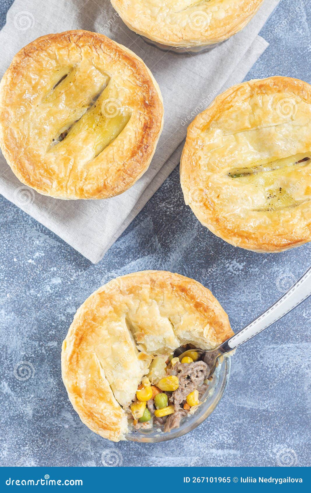 Small Beef Pot Pie or Deep Dish Pie in Ramekin, Crust Broken Open