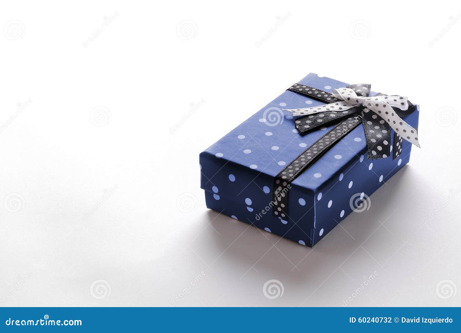 Small Blue Gift Box with Ribbon and Circles Stock Photo Image of