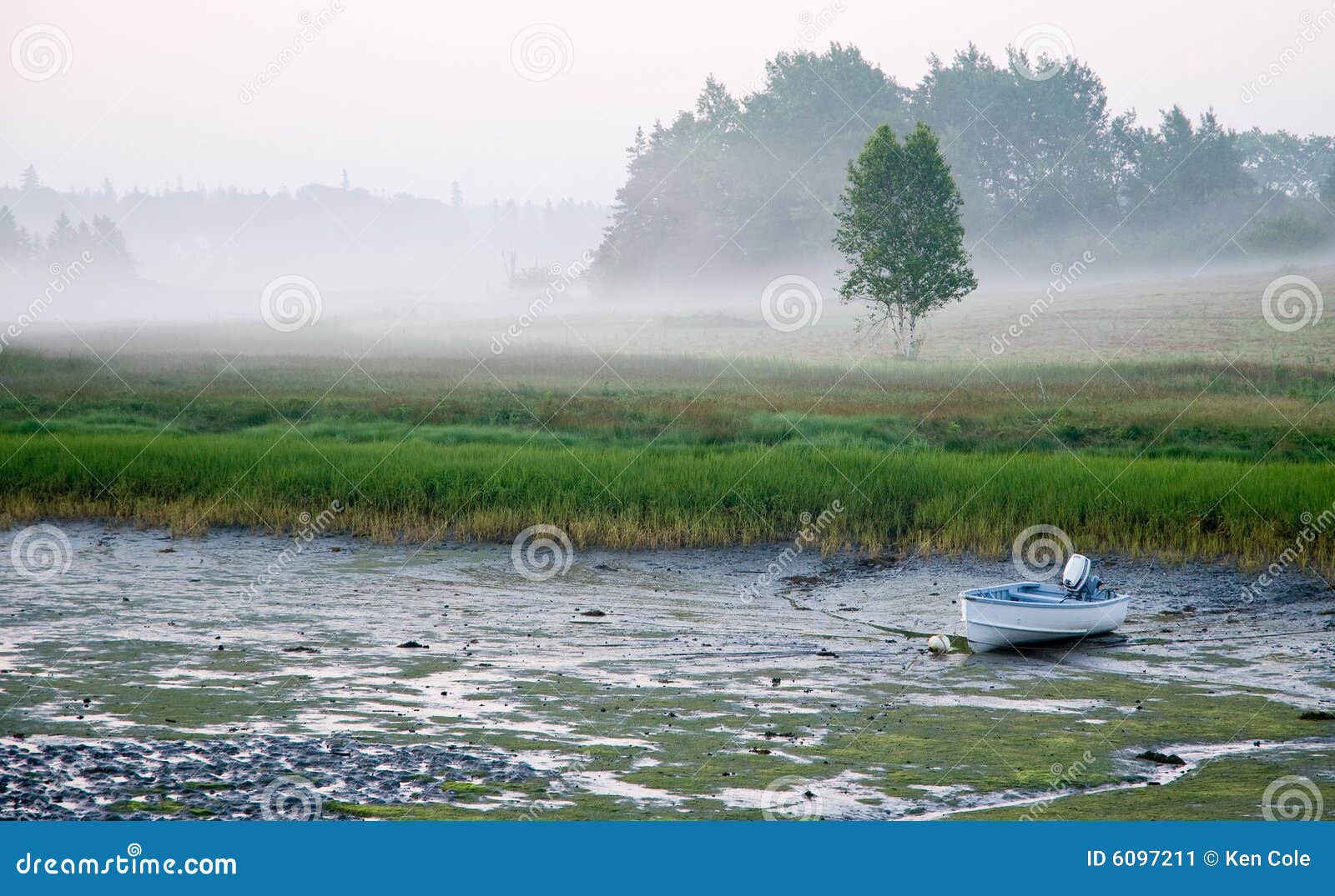 small boat at low tide