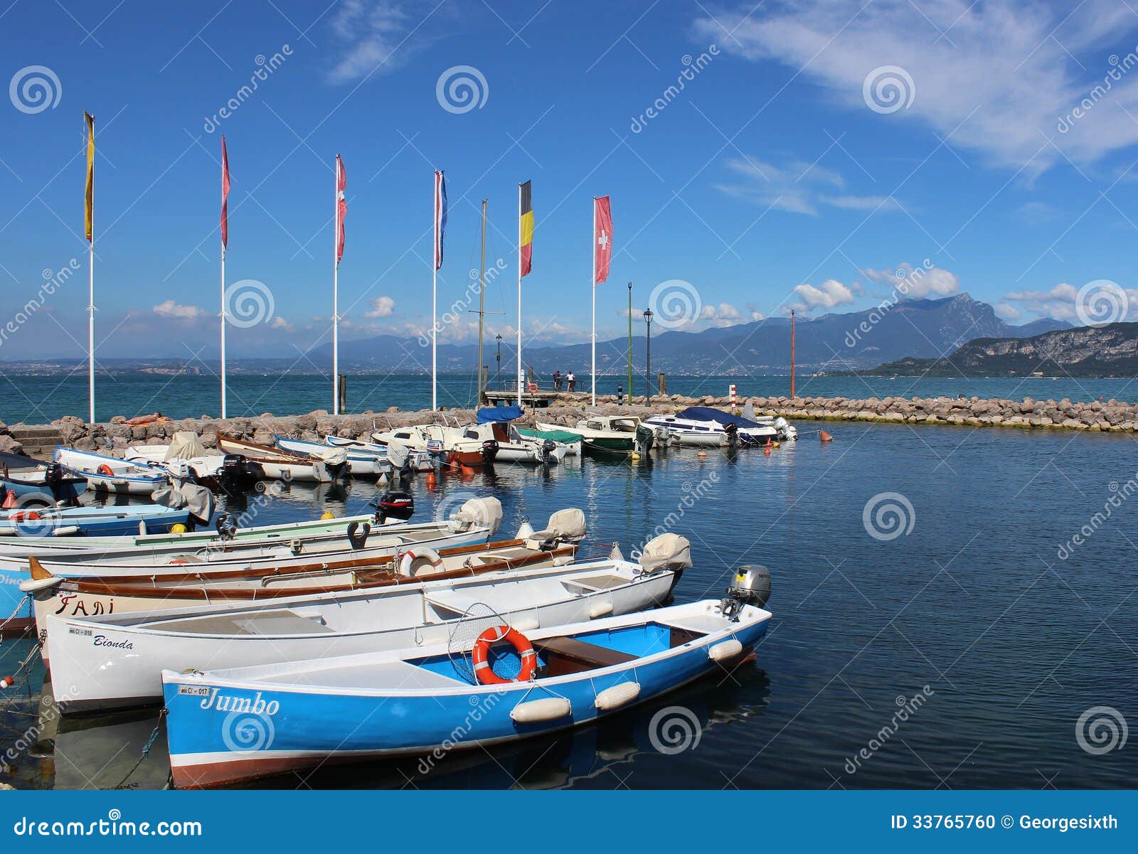 Small Boats In Cisano Harbor, Lake Garda, Italy Editorial ...