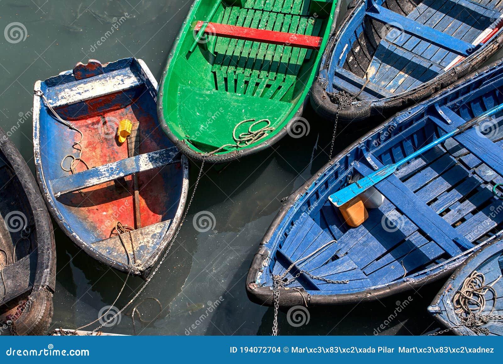 small boats moored in the port