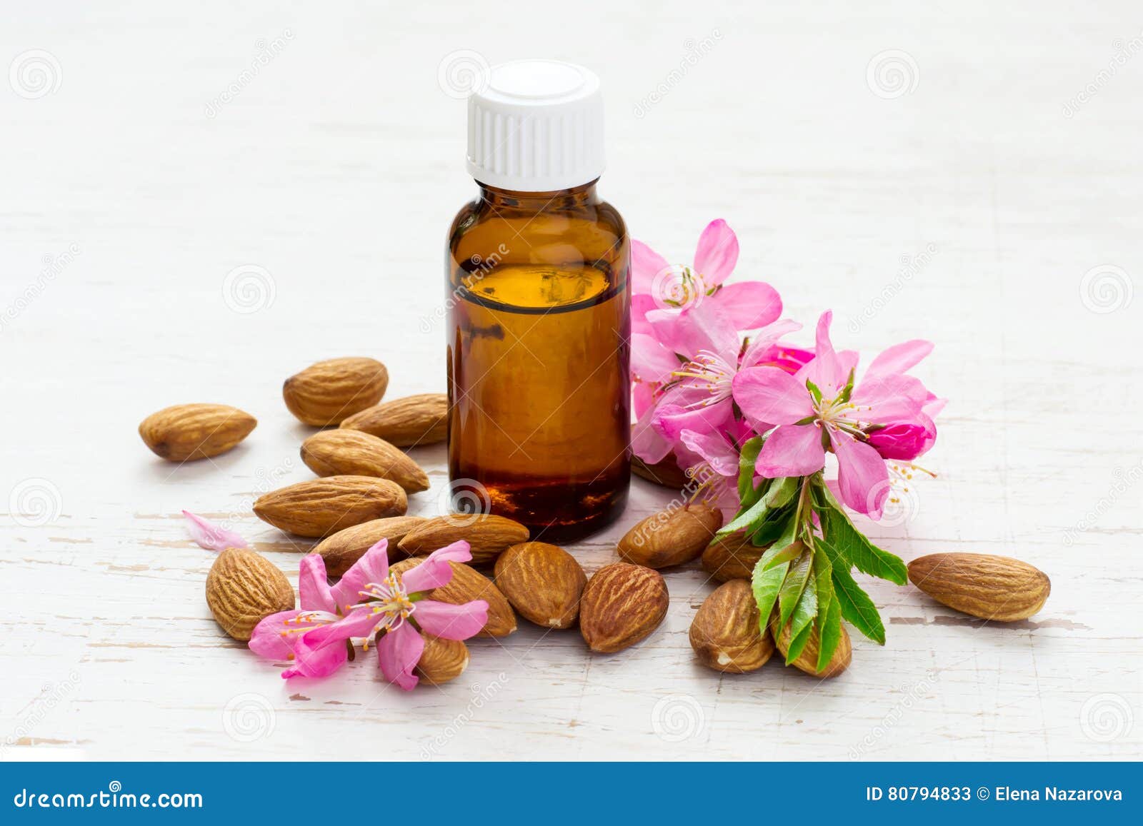 Small Bottle of Almond Oil, Almonds and Flowers Stock Image Image of