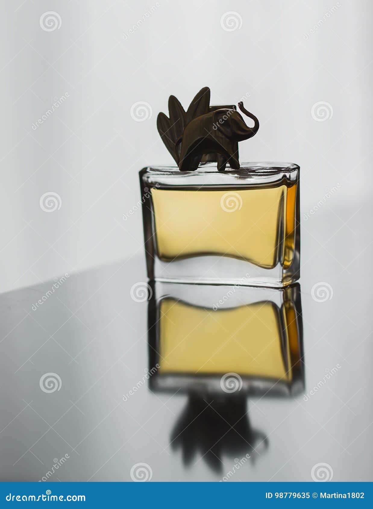 Small bottle of perfume stock image. Image of female 98779635