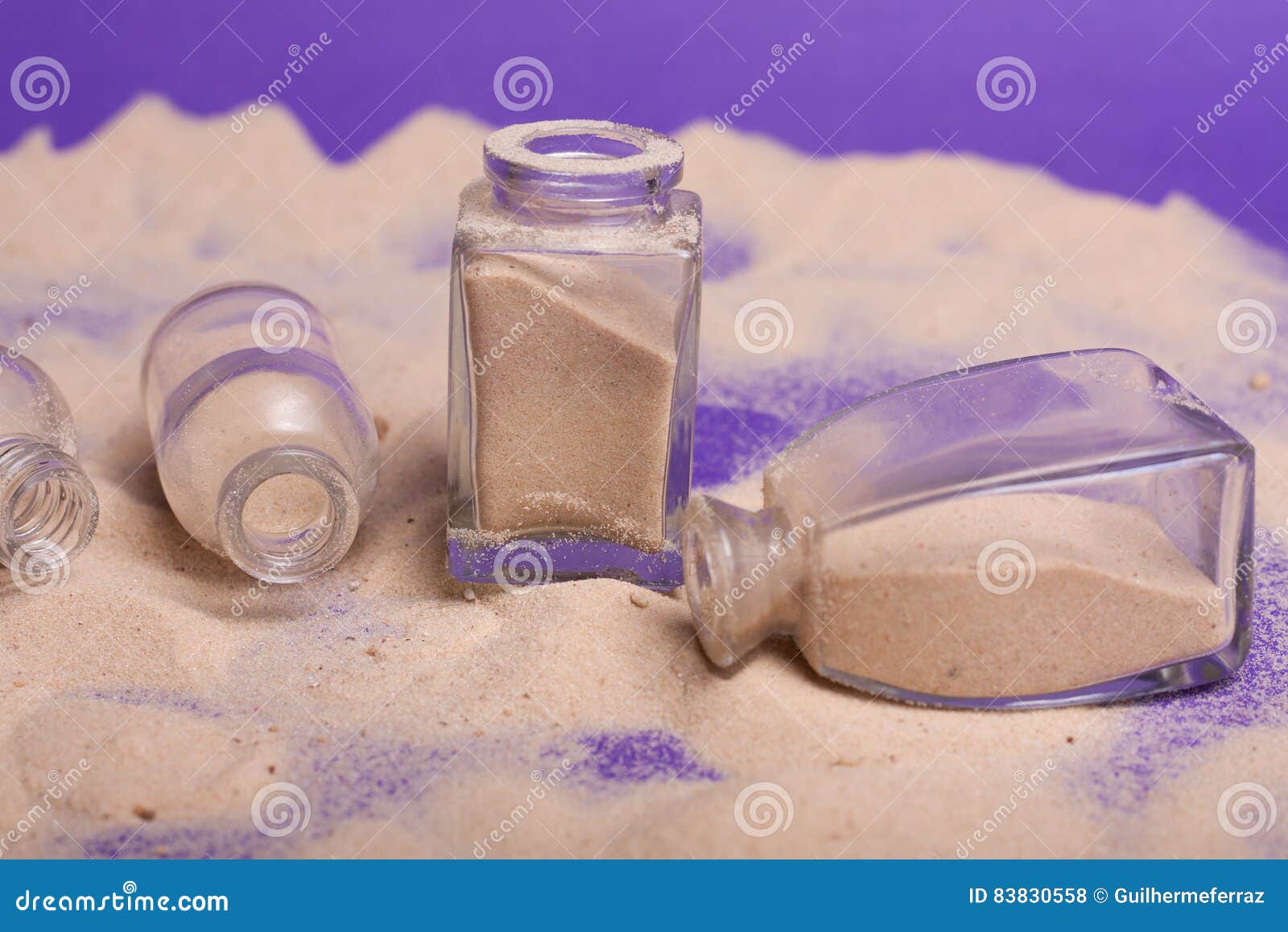 small bottles with sand