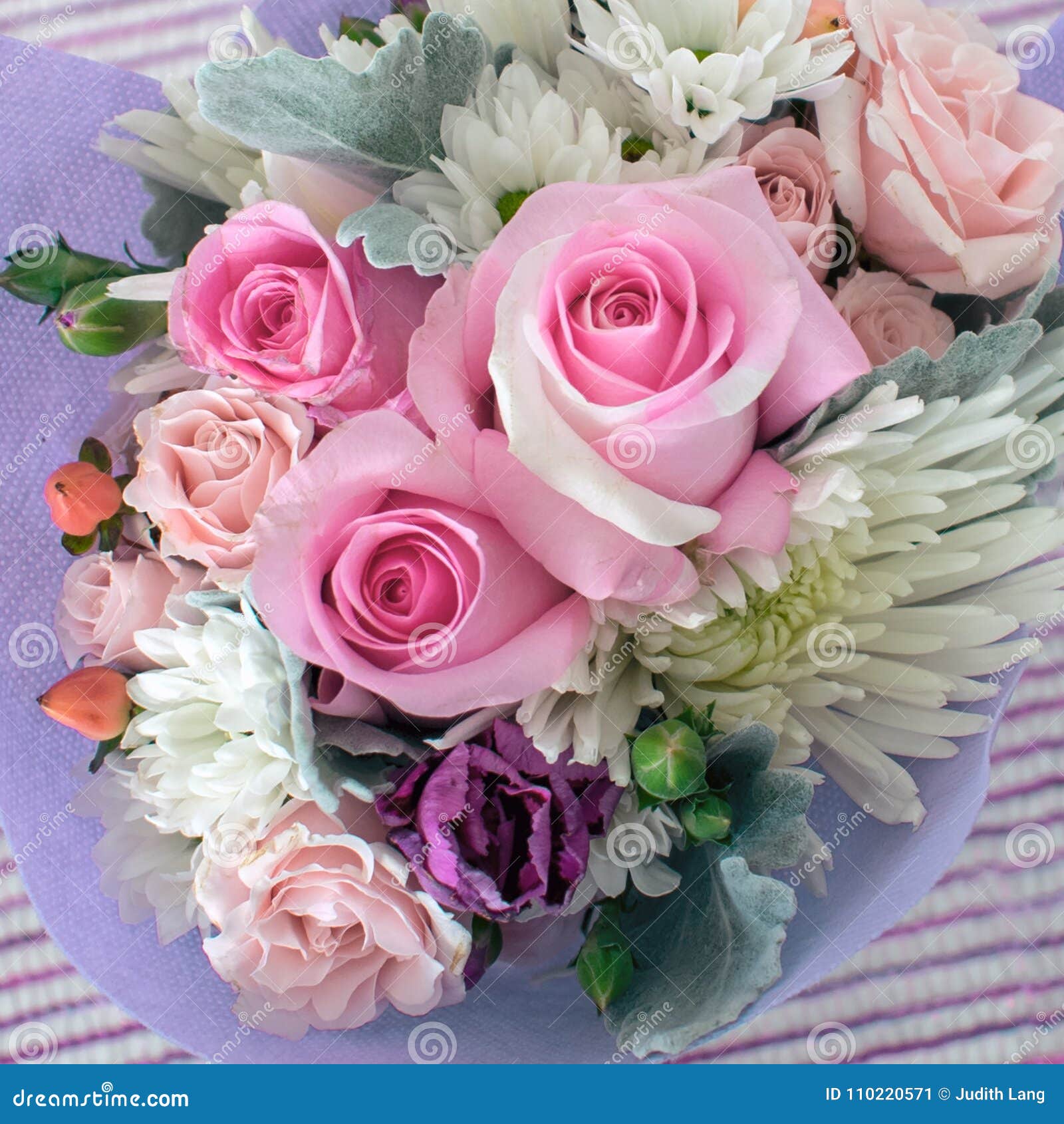 A Small Bouquet of Petite Flowers Including Pink Roses. Stock Image