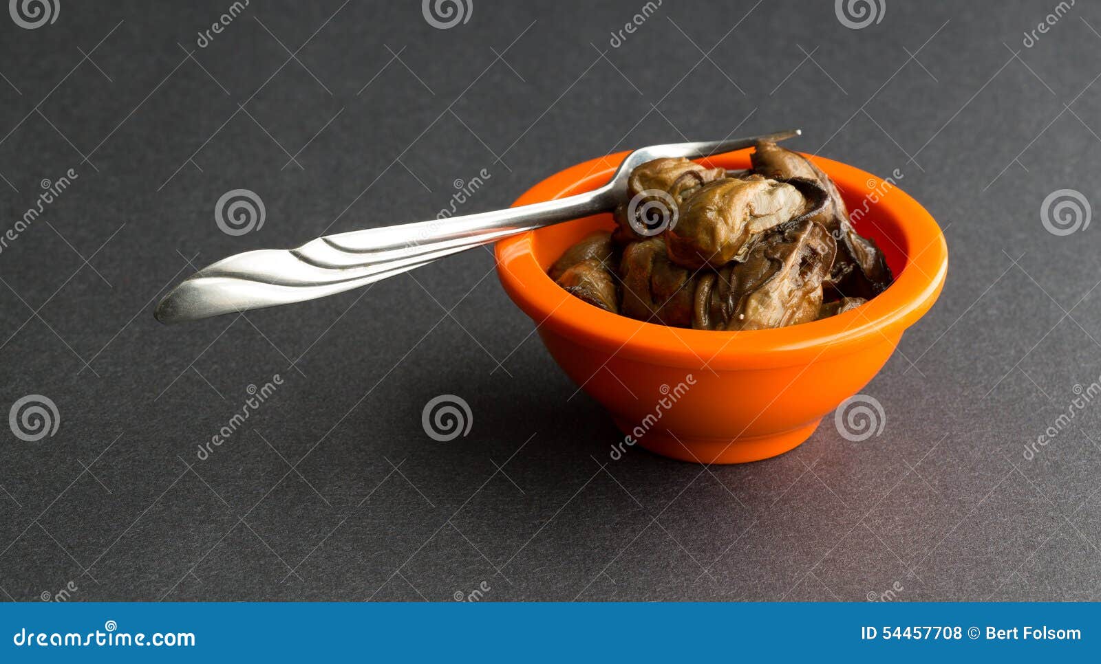 Small Bowl of Smoked Oysters with a Fork Stock Photo Image of