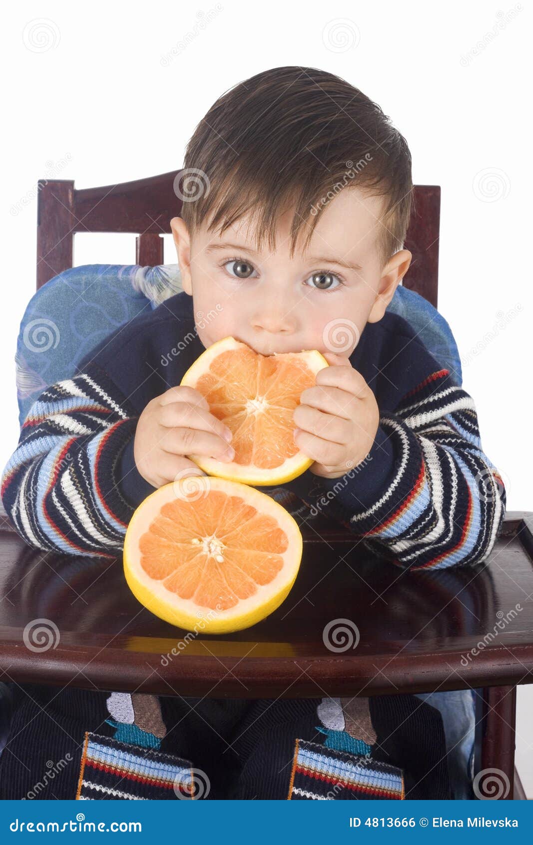 Small Boy Eats Fresh Grapefruit Stock Photo Image of orange, cheerful