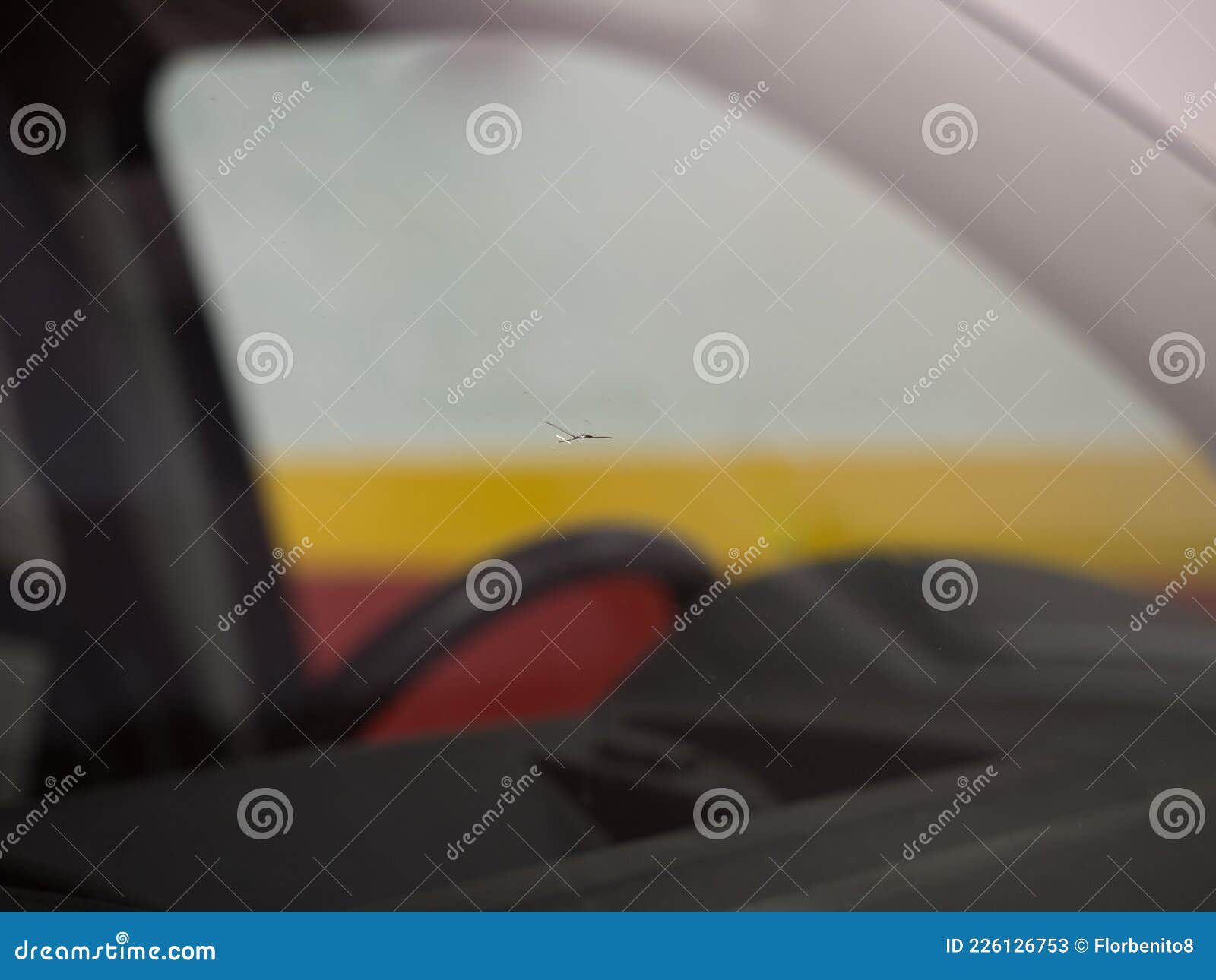 Small Breakage of the Front Glass of a Car Inside a Garage Stock Image