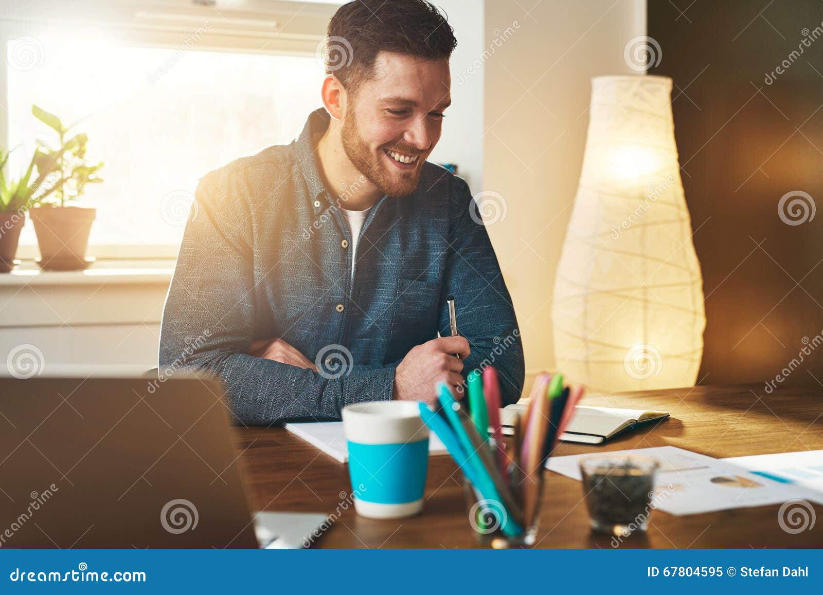 small business entrepreneur at work in his office